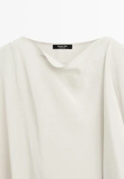 Massimo Dutti SHORT FLOWING CAPE WITH SLEEVE DETAIL - Cape - Beige -Massimo Dutti Shop 2ba3792f9c774152adabdae7d8d74d6c